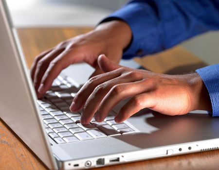 A Man Working on Laptop